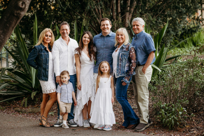 Extended family group portrait with grandparents, parents, and children